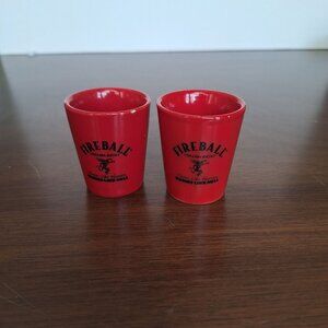 (2) FIREBALL CINNAMON WHISKEY SHOT GLASSES RED WITH BLACK WRITING LETTERS F & L